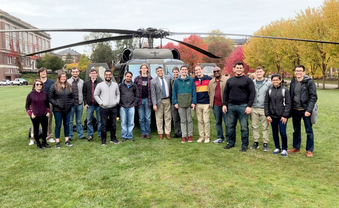 MOVE students with Black Hawk helicopter